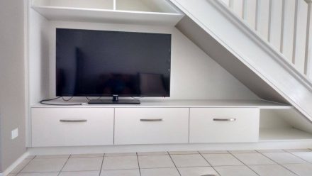 wall under under stairs space saver